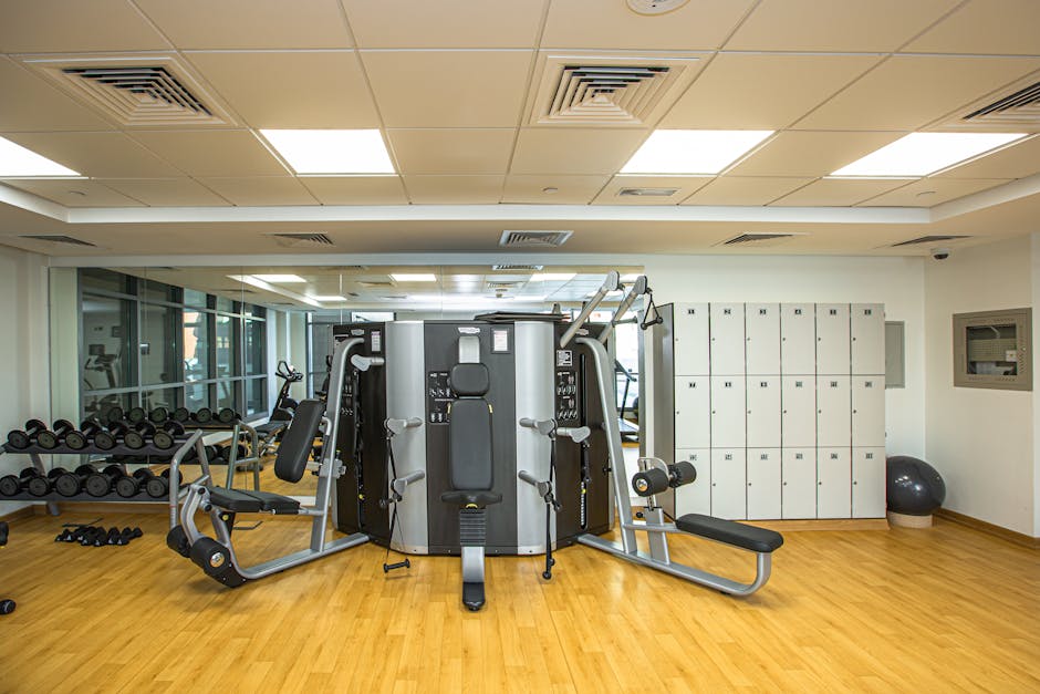 Spacious gym interior showcasing modern exercise equipment and storage lockers.
